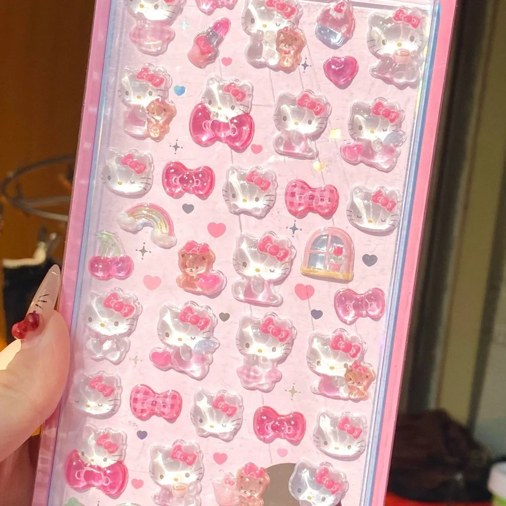 Naklejki 3D Hello Kitty, urocze, kreskówkowe, stereoskopowe, kryształowe dekoracje na obudowę telefonu, nowe… Naklejki 3D Hello Kitty, urocze, kreskówkowe, stereoskopowe, kryształowe dekoracje na obudowę telefonu, nowe…