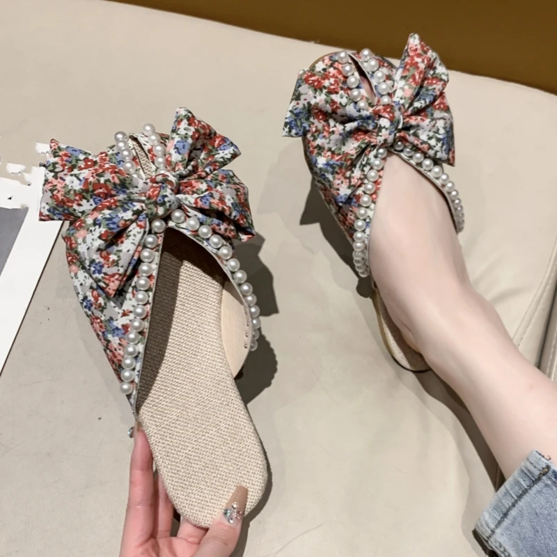 Nowa letnia moda Wygodne sandały z perłową kokardą Okrągła główka Płaskie sandały Torba na palce Wszechstronne… Nowa letnia moda Wygodne sandały z perłową kokardą Okrągła główka Płaskie sandały Torba na palce Wszechstronne…