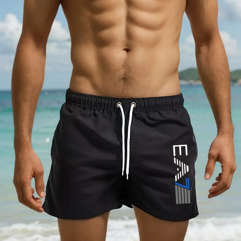 Nowe letnie modne, lekkie, luźne i oddychające szorty plażowe z nadrukiem, idealne do sportu i fitnessu. Nowe letnie modne, lekkie, luźne i oddychające szorty plażowe z nadrukiem, idealne do sportu i fitnessu.